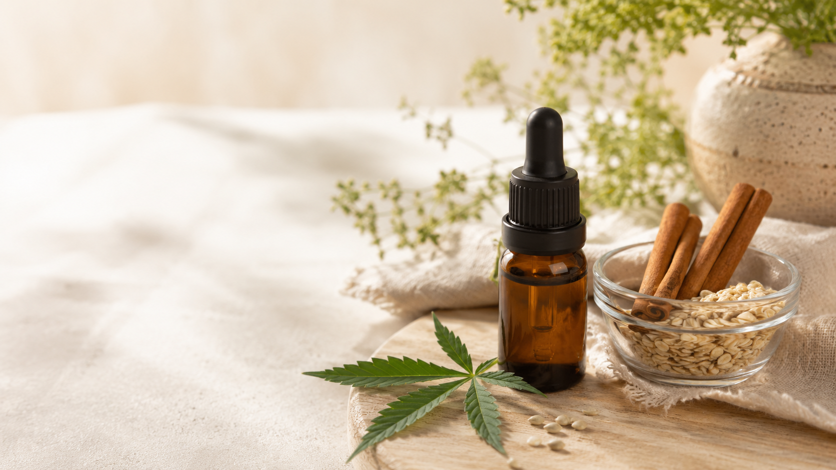 Amber CBD oil bottle beside cinnamon sticks, raw oats, and a fresh hemp leaf on a warm natural surface, symbolizing evidence-based wellness and balanced lifestyle support for diabetes.